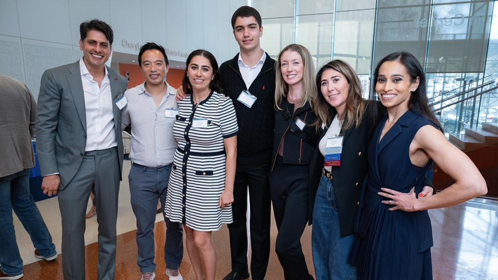 Group of alumni smiling for camera