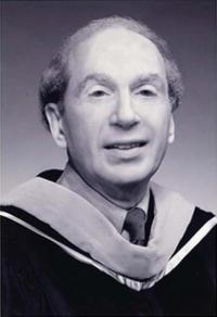 Headshot of Dr. Formicola who is a white bald man