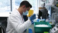 Researcher working in lab.