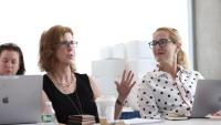 Sharon Perelman discuss AI at a convening.