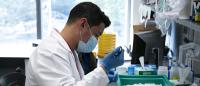Researcher working in lab.